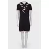Black and pink dress with ruffles on the chest