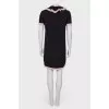 Black and pink dress with ruffles on the chest