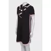 Black and pink dress with ruffles on the chest