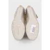 White knitted shin boots