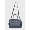 Black and blue leather bag