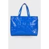 Lacquered blue bag with a metal keyring