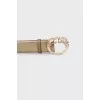 Gold-tone belt with dragon buckle