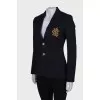 Jacket with golden embroidery on the pocket