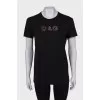 Black T-shirt with sequin logo and tag