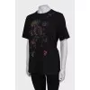 T-shirt with embroidery, with a tag
