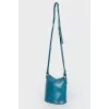Turquoise bag with chain handle