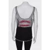 T-shirt in mesh, with a tag