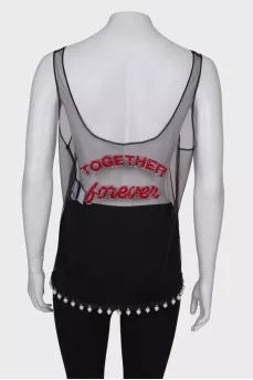 T-shirt in mesh, with a tag