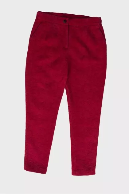 Children's red trousers with a textured pattern