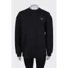 Black sweatshirt with brand logo