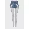 Shorts with torn and worn effect