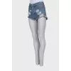 Shorts with torn and worn effect