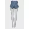 Shorts with torn and worn effect