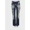 Ripped and washed effect jeans with print