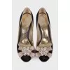 Textile shoes with flower appliqué