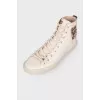 Leather sneakers with "tiger" application