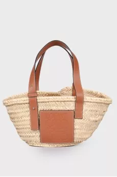Straw bag with leather handles