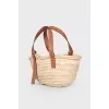Straw bag with leather handles