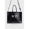 Leather bag with brand logo