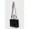Leather bag with brand logo