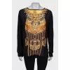 Blouse with gold print