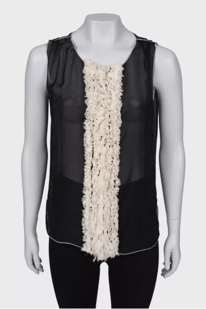 Sleeveless translucent blouse