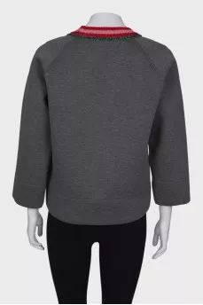 Gray sweatshirt with a decorated collar
