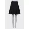 Black textured skirt with tag