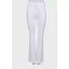 White flared trousers with tag