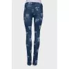 Skull jeans with distressed effect