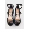 Leather sandals with belt buckles