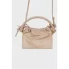 Leather bag with a thin strap