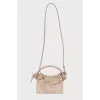 Leather bag with a thin strap
