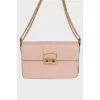 Powder bag with chain strap