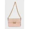 Powder bag with chain strap