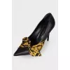 Shoes with textile bow