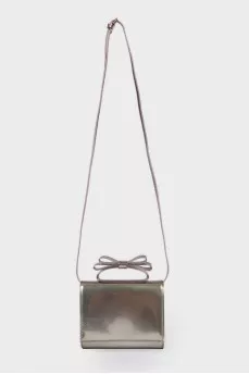 Silver bag with a bow on the handle
