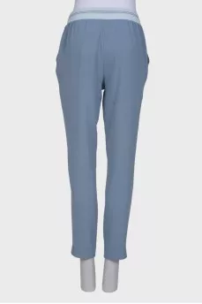 Blue trousers with elastic