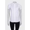Blouse with ruffles on the chest
