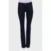 Blue jeans with gold hardware