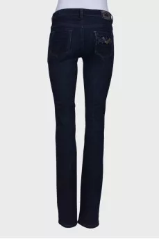 Blue jeans with gold hardware