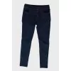 Blue jeans with a zipper at the bottom