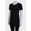 Black tunic with gold fittings