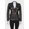 Leather jacket with gold hardware