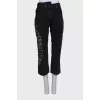 Black jeans with asymmetry