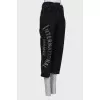 Black jeans with asymmetry