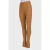 Mustard trousers with hooks at the bottom