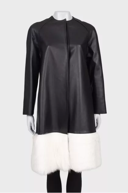 Leather coat with white fur on the hem