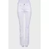 Jeans with embroidered back pocket